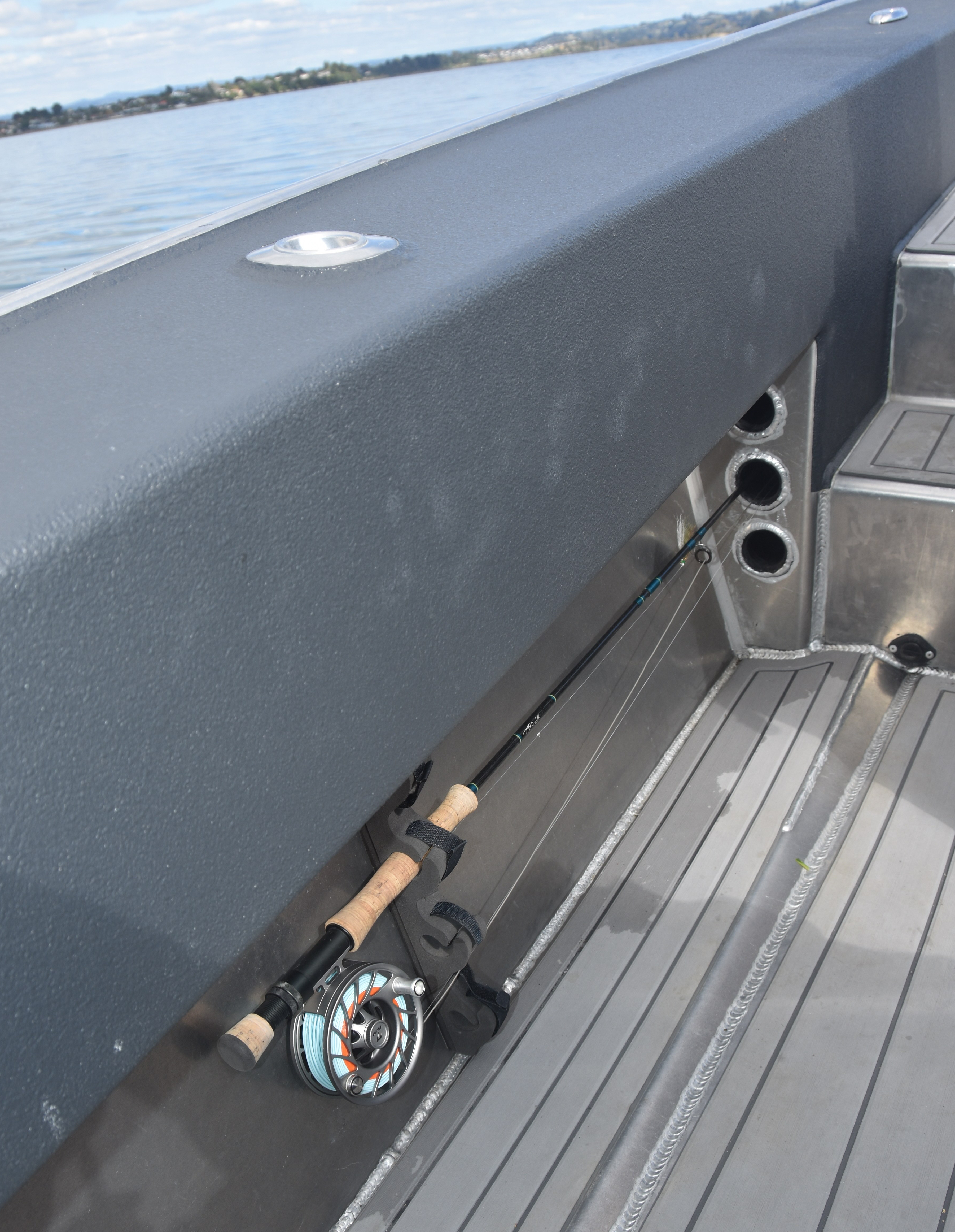 fly rod, boat, rod rack, storage, fishing guide, kingfish, flats, kahawai