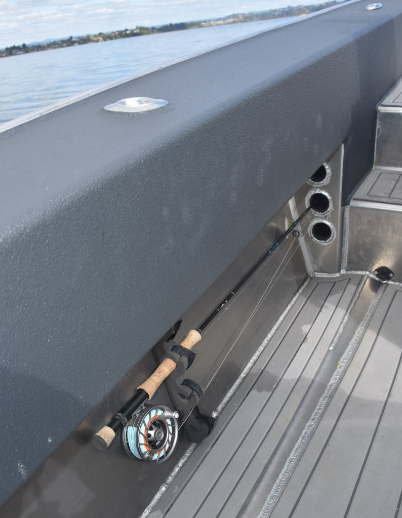 fly rod, boat, rod rack, storage, fishing guide, kingfish, flats, kahawai